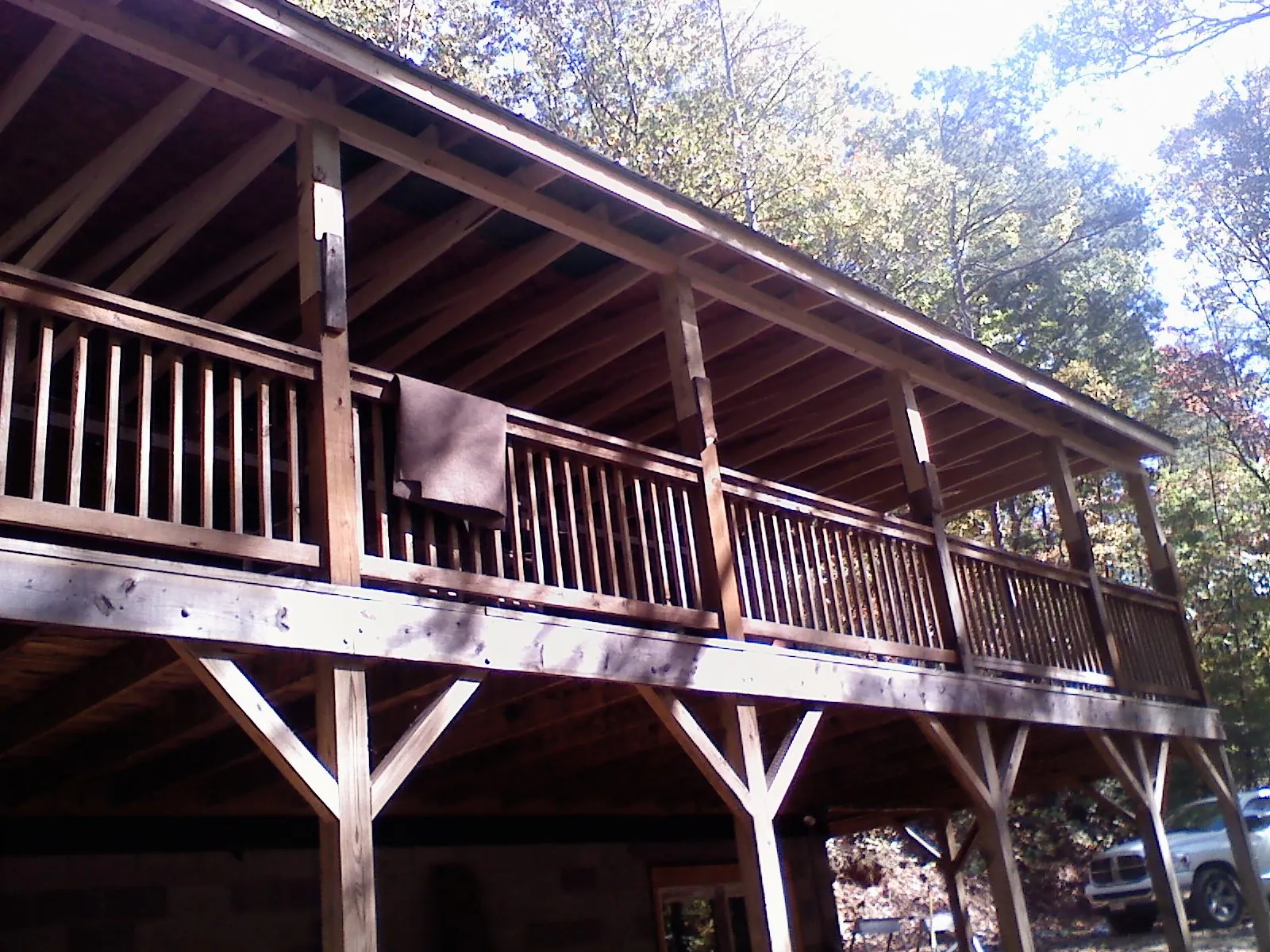 Timber framing under a new elevated porch and deck — Roof Leak Repair in Gonzales by Roofing Brothers